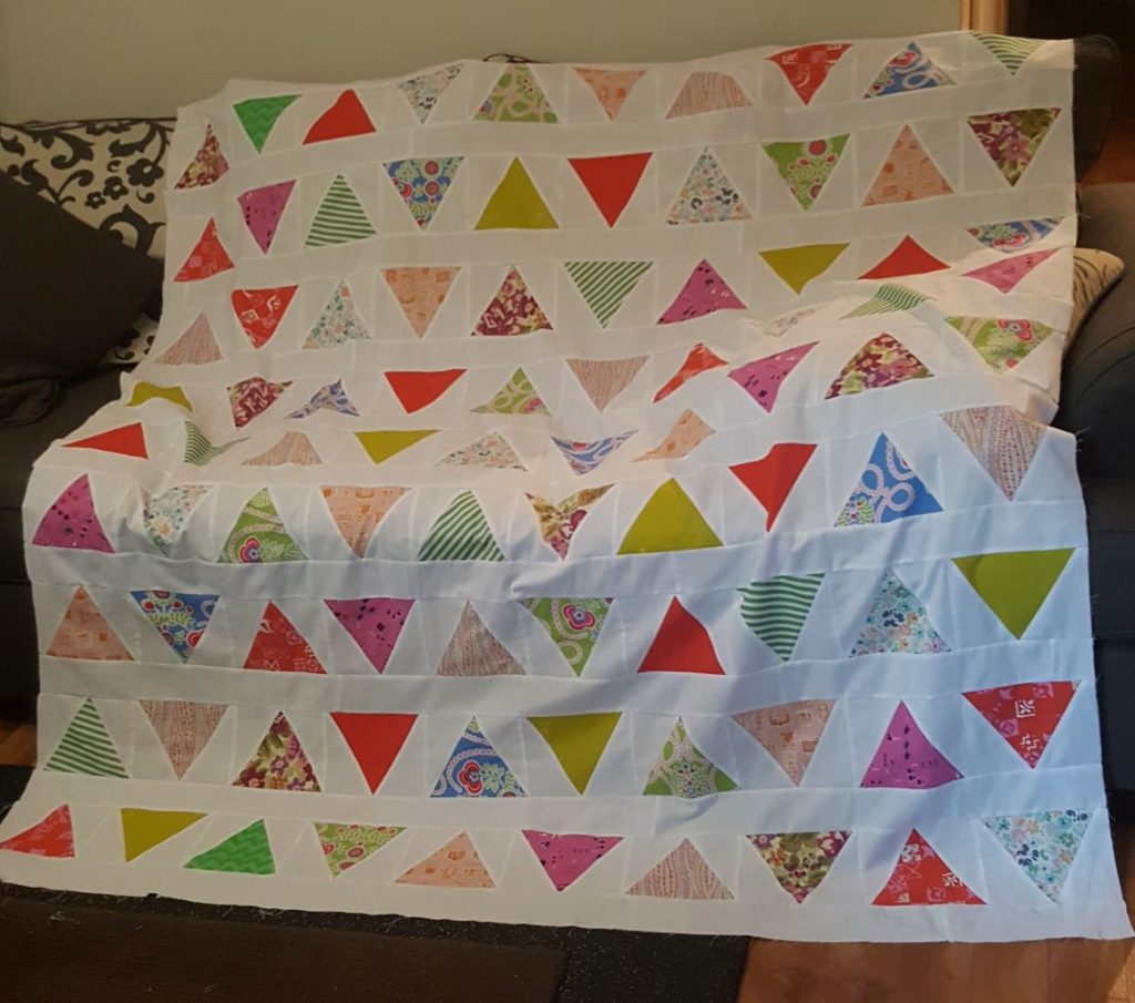 Triangle Pop Pattern quilt top. Pattern by Emily Dennis