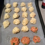 Fish balls on tray before baking