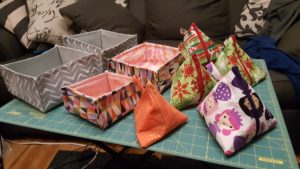 Fabric boxes and assorted triangle pouches