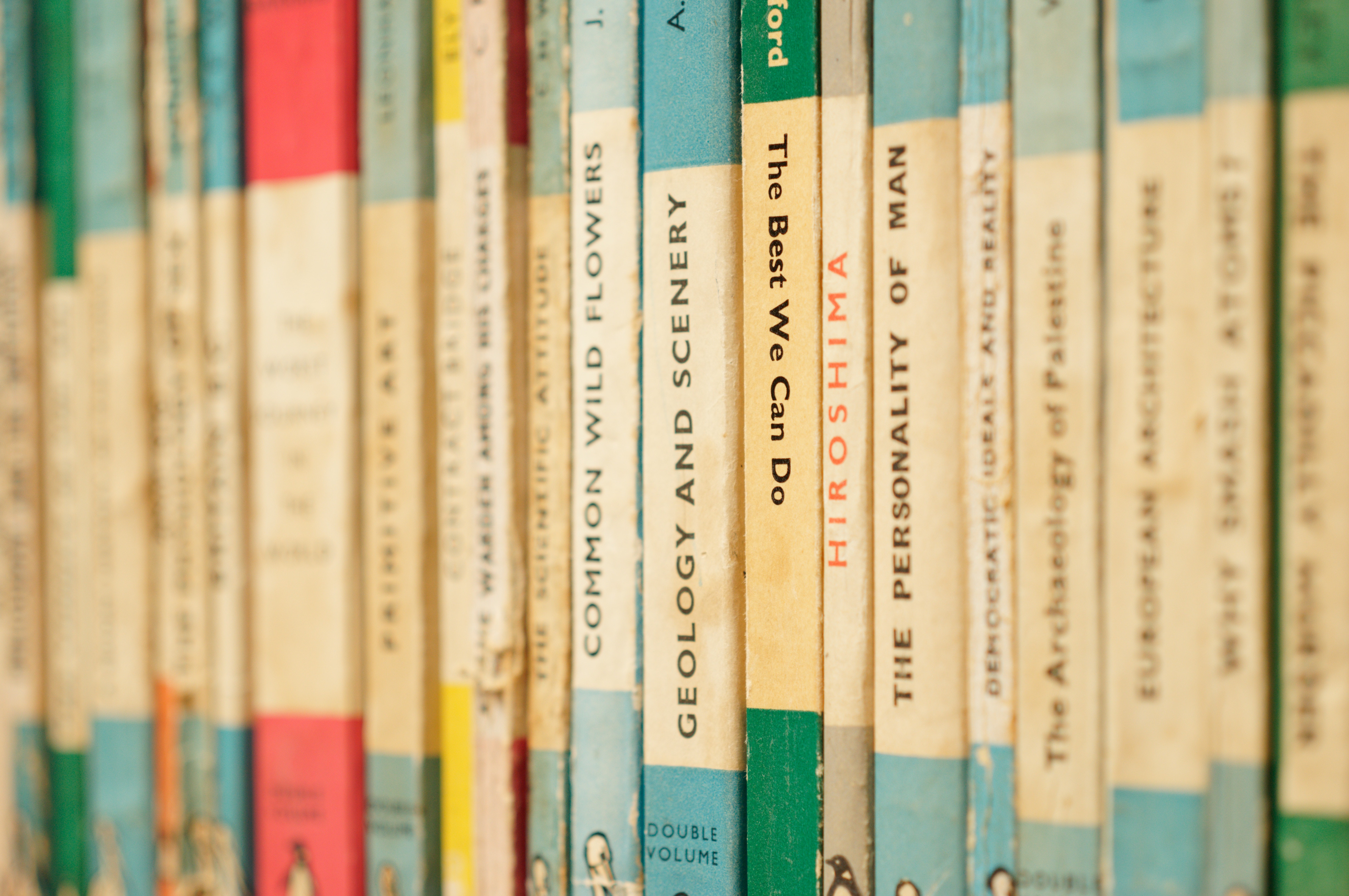 Photo of several vintage Penguin books by Karim Ghantous on Unsplash