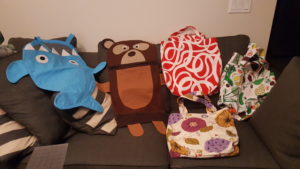 Fish and bear shaped laundry bags. 3 tote bags with fabric from Ikea and Fabricland.