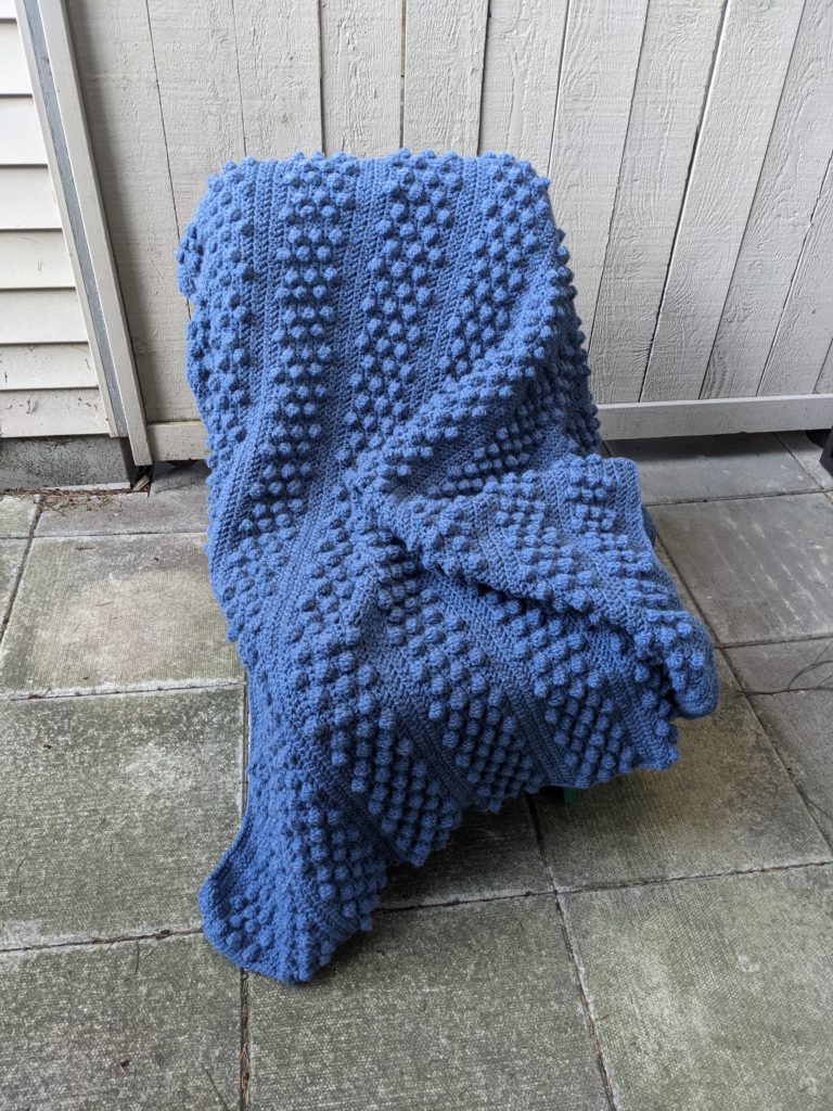 The Bobble Throw, on chair